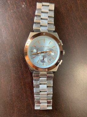 Michael Kors Silver and Rose Gold Men’s Chronograph Watch with Light Blue Dial